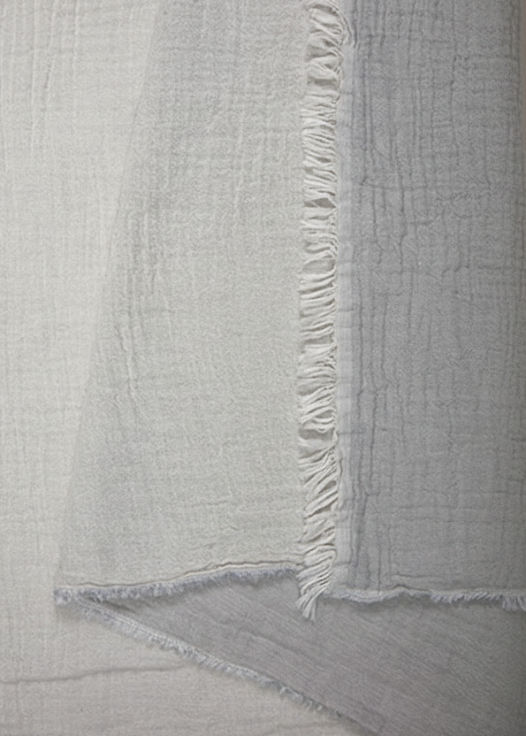 Gray textured "Nova" Peshtemal Towel with frayed edge.