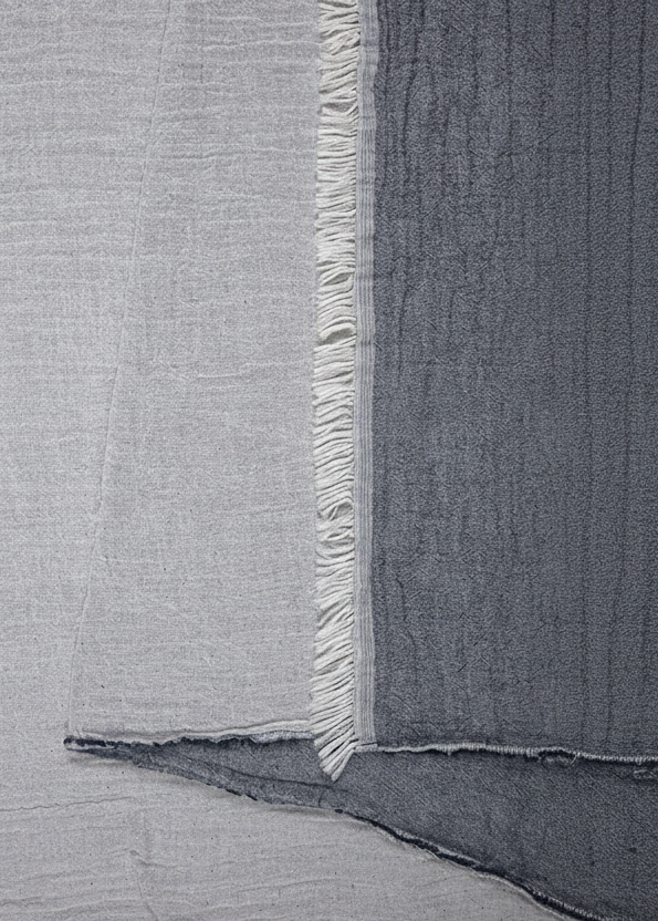 Navy textured "Nova" Peshtemal Towel with frayed edge.